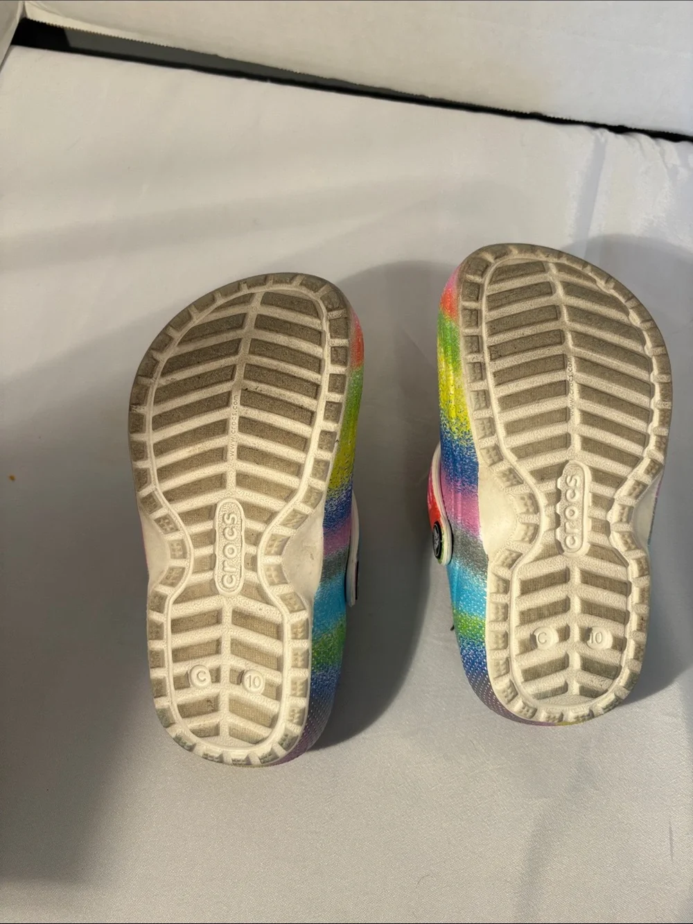 CROCS Kids Rainbow Foam Clogs with Black Fleece Lining